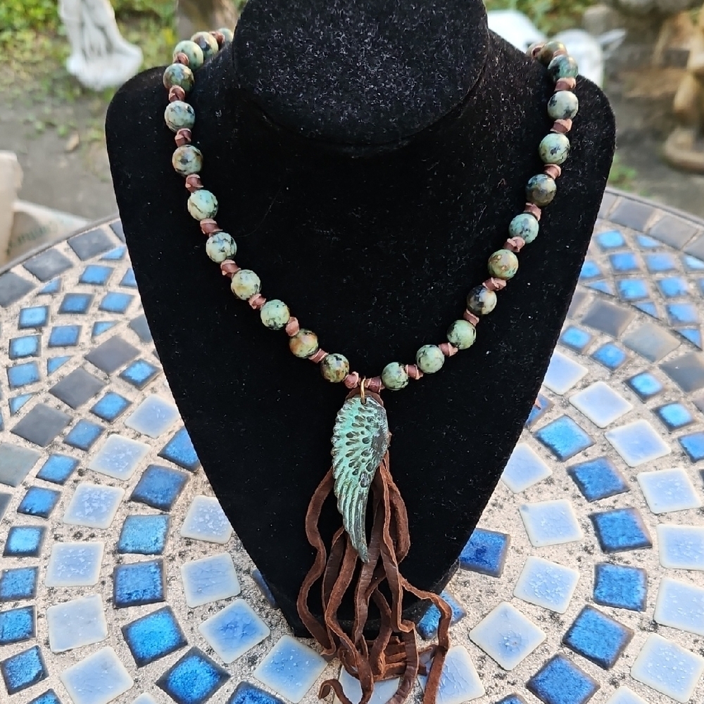 Brown Suede Green Speckled Glass Beaded Wing Pendant